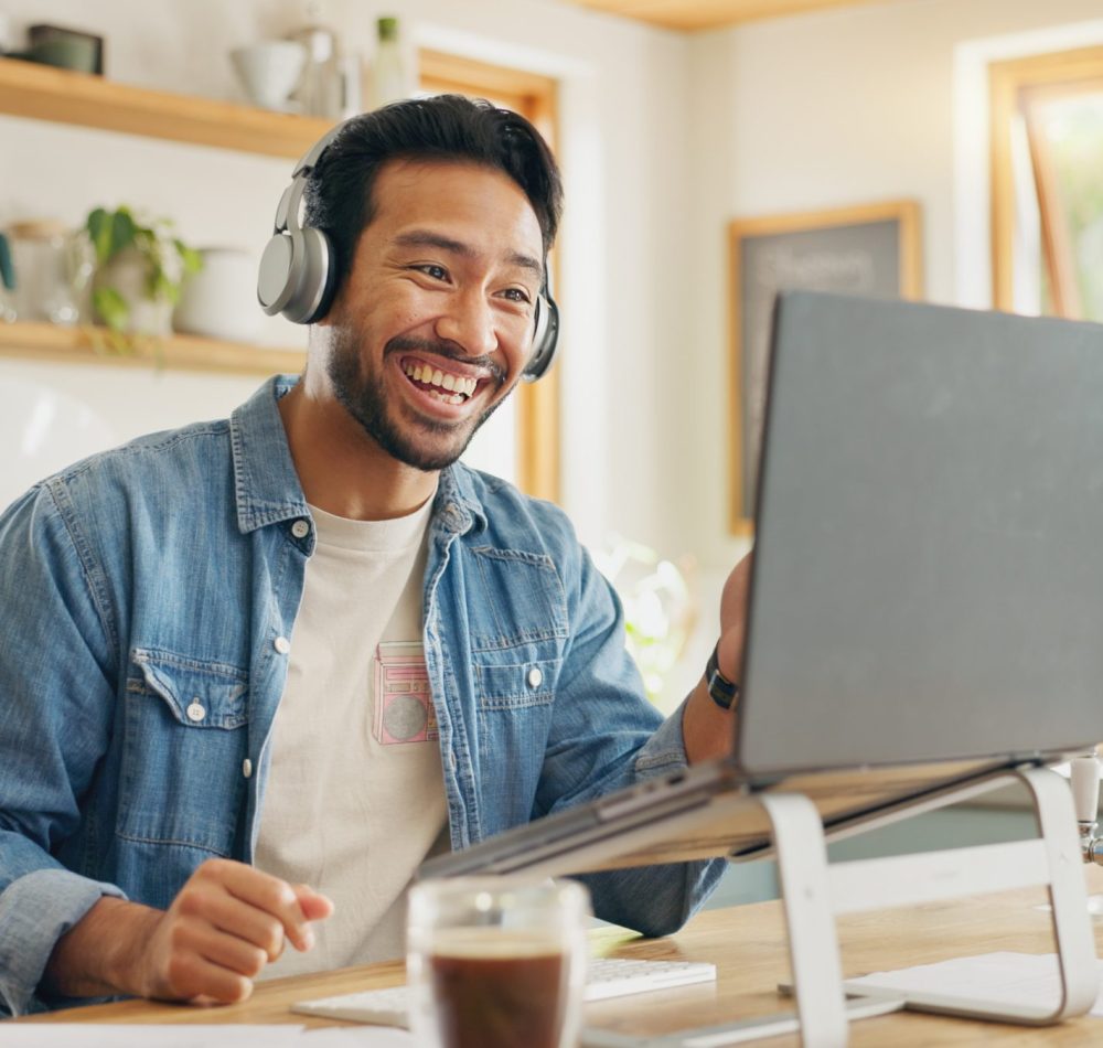 Remote work from home, talking and man with a laptop, video call or social media with online meetin.
